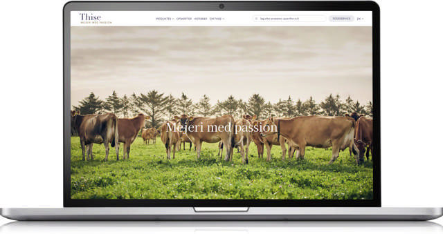 Et mockup af en bærbar computer, der viser Thise Mejeris hjemmeside 